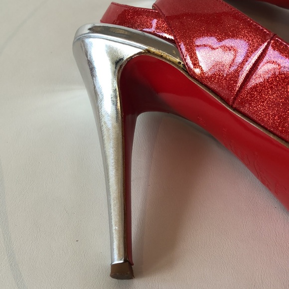 📸✨ New Arrival Alert! Step into luxury with the Sandaloo  Christian Louboutin glitter wrap around platform heels